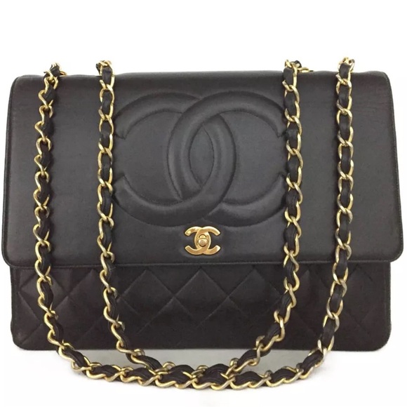 CHANEL Handbags - CHANEL Black and Gold Shoulder Bag
